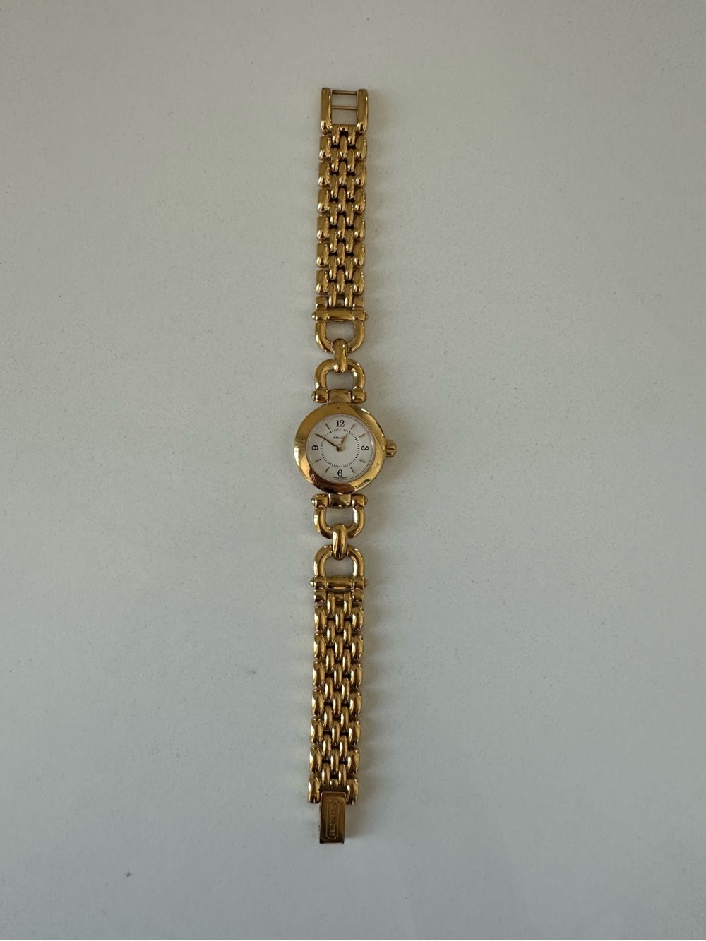 Coach Gold Tone vintage watch with white face